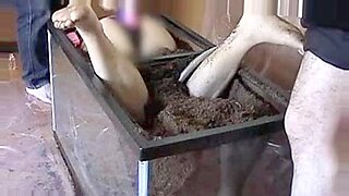 Buried Asian babe explores pleasure